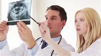 Doctors looking at an x-ray