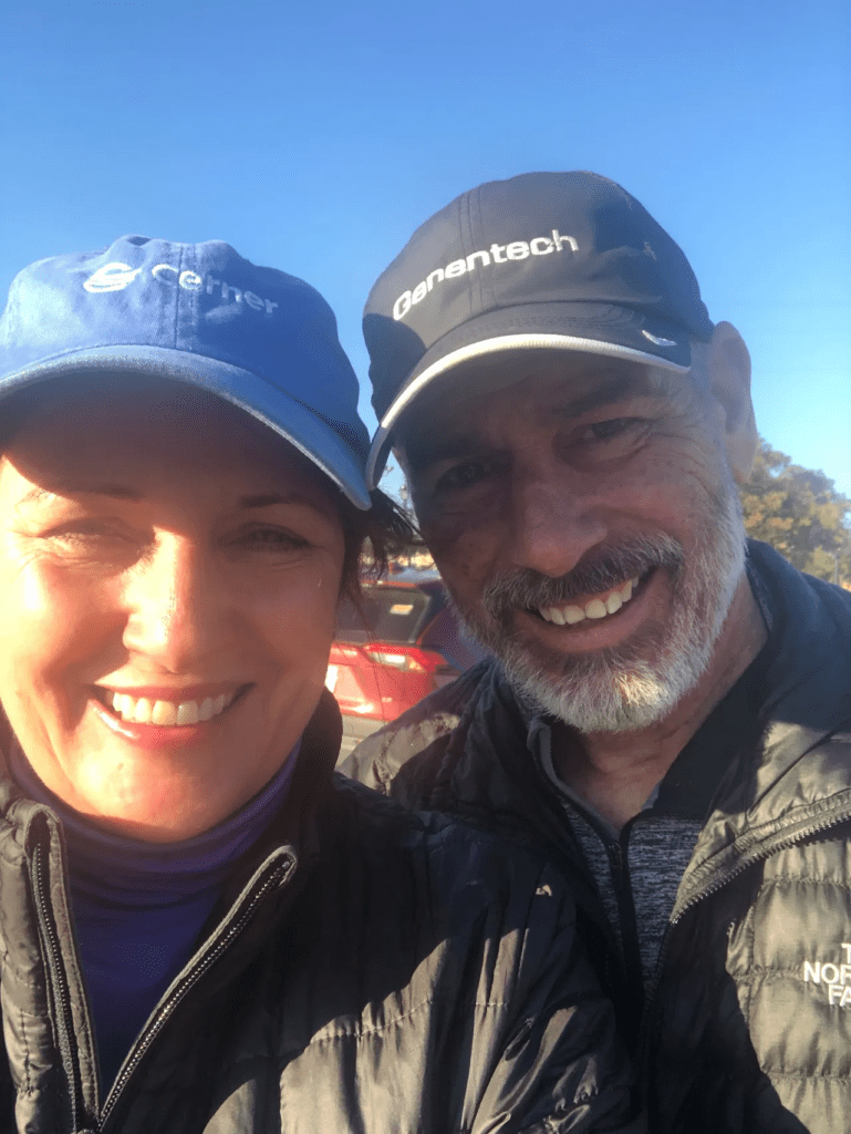 selfie of a couple wearing caps